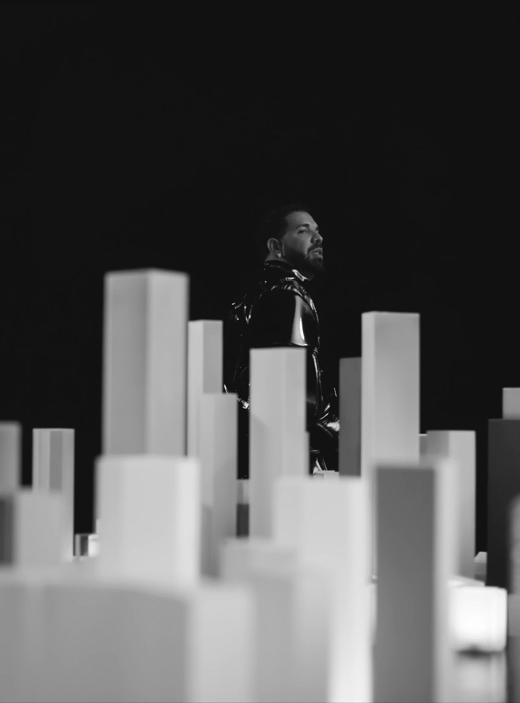 Drake Diaorama for Kindle Paperwhite wallpaper featuring man and figure and more