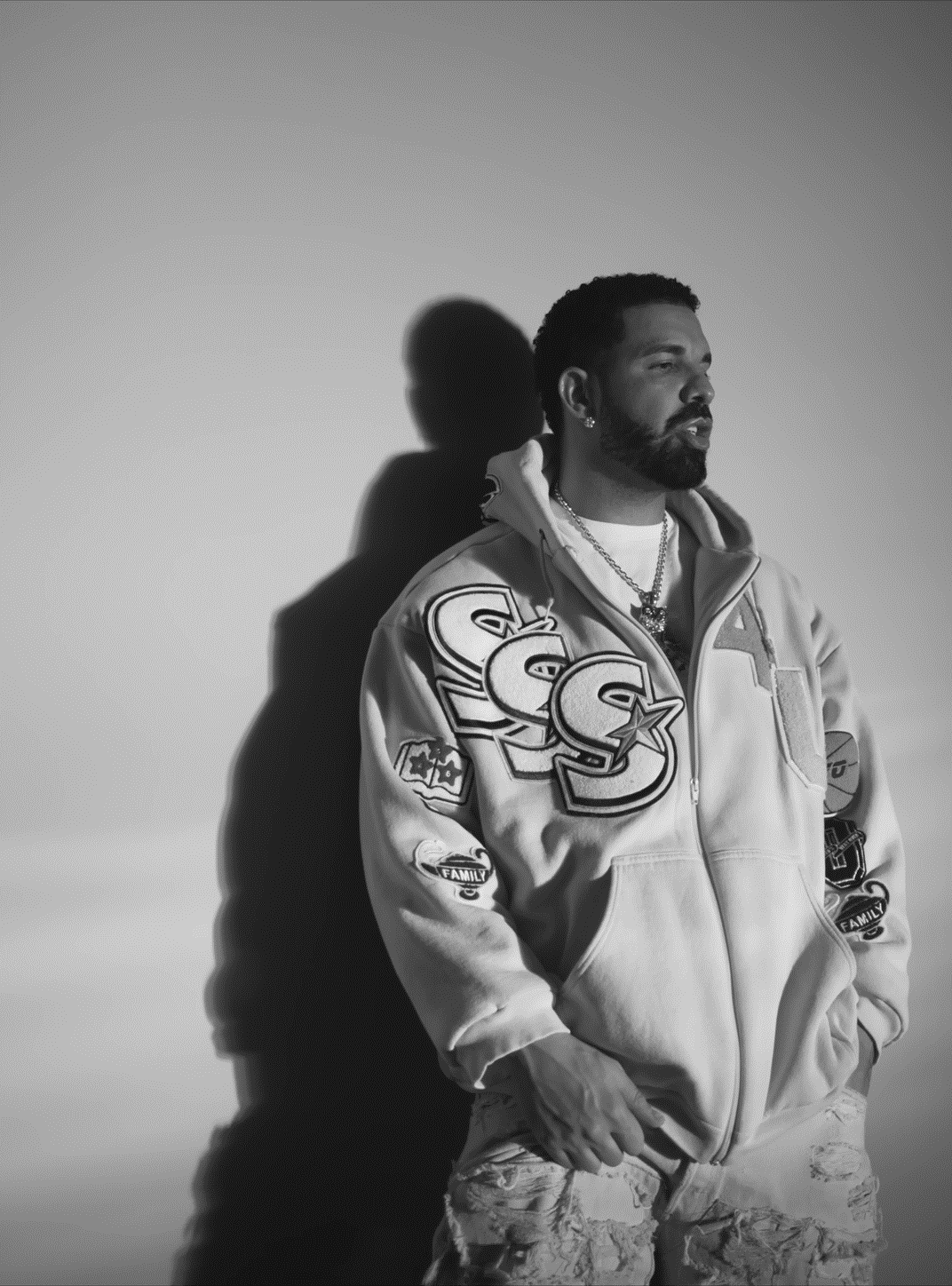 Drake standing for Kindle Paperwhite wallpaper featuring man and portrait and more