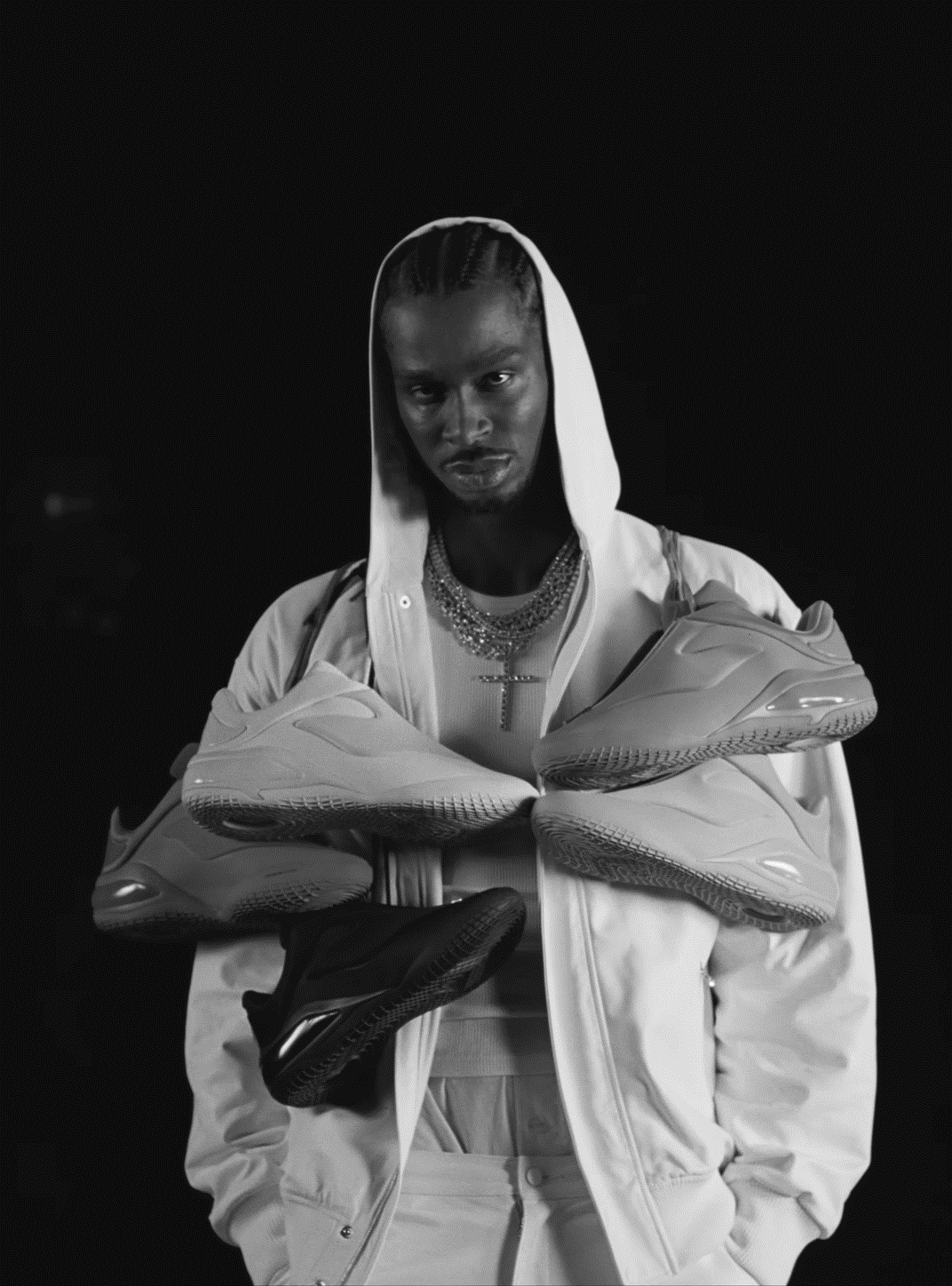 Man with shoes for e-reader wallpaper featuring man and sneakers and more